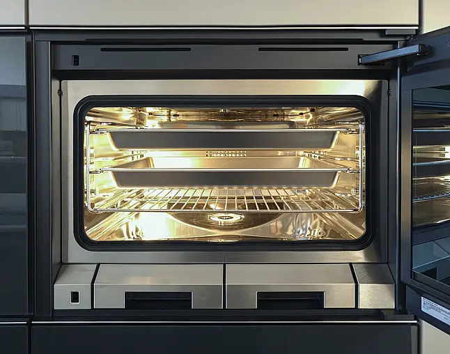 TOP-AKTUELLE HIGH-END GERÄTEAUSSTATTUNG VON GAGGENAU: Backofen mit 300°C -Backstein + separater Dampfbackofen (beide  mit Kerntemperatursensor) + Kaffeeautomat + Wärmeschublade + Vakuumierer! berbel Muldenlüfter mit Infinity-Kochfeld u. permalyt-Filter!