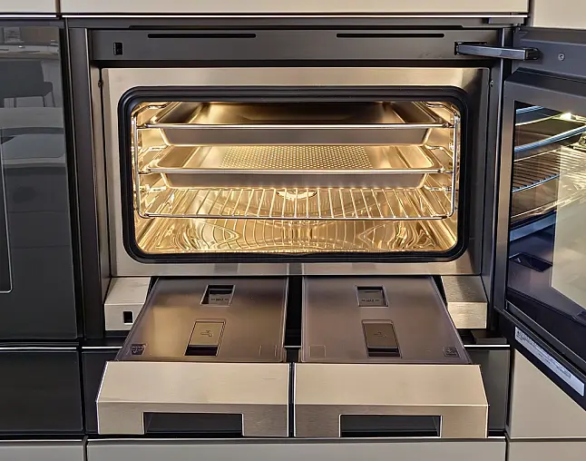 TOP-AKTUELLE HIGH-END GERÄTEAUSSTATTUNG VON GAGGENAU: Backofen mit 300°C -Backstein + separater Dampfbackofen (beide  mit Kerntemperatursensor) + Kaffeeautomat + Wärmeschublade + Vakuumierer! berbel Muldenlüfter mit Infinity-Kochfeld u. permalyt-Filter!