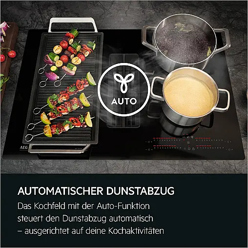 Modernes, neues Induktionskochfeld von AEG mit integrierter Muldenlüftung Umluft oder Abluft
