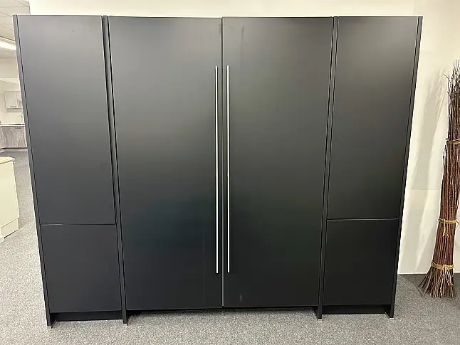 modernes Disign mit Pocket Door uns Kochinsel mit Massivholz