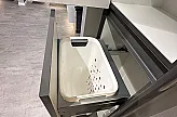 Schrankauszug mit Wäschekorb