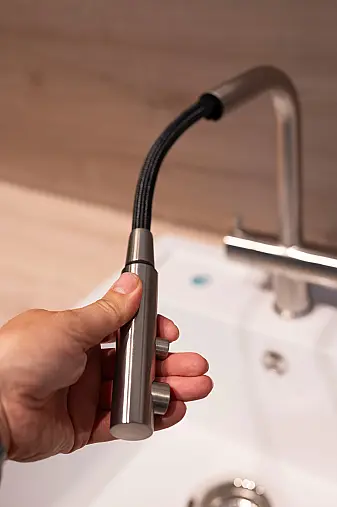 Grifflose Designerküche mit Hochglanzfronten und Miele Geräten