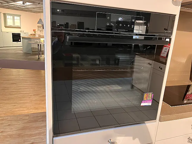 Moderne L-Küche mit Silestone Plattenanlage und Rückwänden