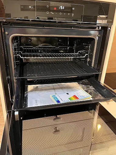 Moderne L-Küche mit Silestone Plattenanlage und Rückwänden
