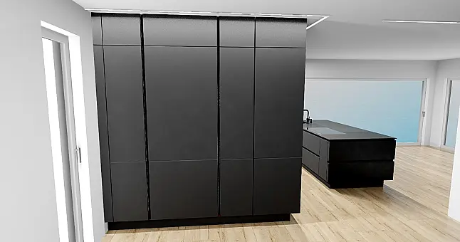 Grifflos schwarze Küche in matter Ausführung mit Holzakzenten und keramischer Arbeitsplatte
