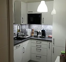 L-Küche in weiß Hochglanz