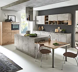 Moderne Küche in Beton Optik mit Kochinsel und Theke